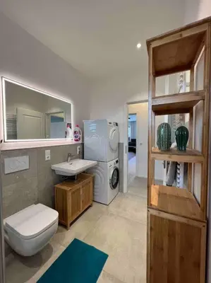 Ein Badezimmer in der Unterkunft 4YOUnic Billard * 2 BR * 75-Zoll TV * Boxspringbett