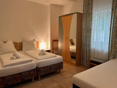 Ein Bett oder Betten in einem Zimmer der Unterkunft Gabi Apartmentresidenz König Ludwig