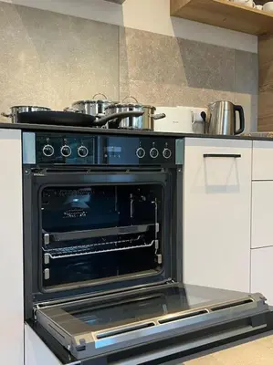 Küche/Küchenzeile in der Unterkunft 4YOUnic Glonn1 * Boxspring * Jacuzzi * Netflix*65“