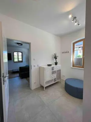 Ein Sitzbereich in der Unterkunft 4YOUnic Glonn1 * Boxspring * Jacuzzi * Netflix*65“