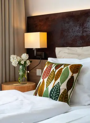 Ein Bett oder Betten in einem Zimmer der Unterkunft Business Class Hotel Ebersberg