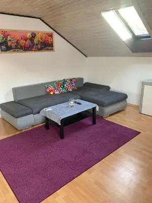 Ein Sitzbereich in der Unterkunft Emy