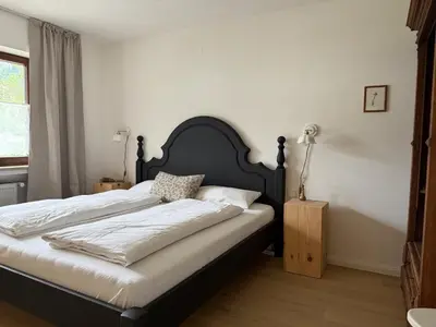 Ein Bett oder Betten in einem Zimmer der Unterkunft Servus O´gau Apartments