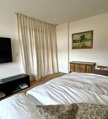 Ein Bett oder Betten in einem Zimmer der Unterkunft Servus O´gau Apartments