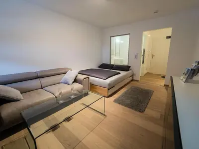 Ein Bett oder Betten in einem Zimmer der Unterkunft Tegernsee - Tolles, zentrales Appartement