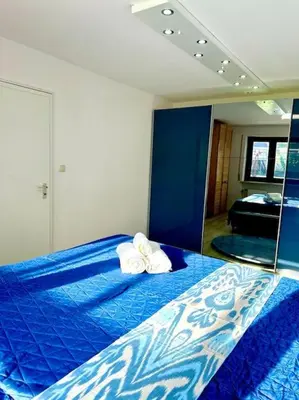 Ein Bett oder Betten in einem Zimmer der Unterkunft Wie Zuhause! Wohnung mit Garten