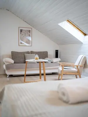 Ein Sitzbereich in der Unterkunft COZY&RELAX APARTMENT-Balkon Küche Parkplatz WIFI Netflix