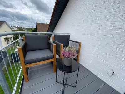 Ein Balkon oder eine Terrasse in der Unterkunft COZY&RELAX APARTMENT-Balkon Küche Parkplatz WIFI Netflix