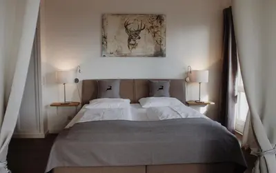 Ein Bett oder Betten in einem Zimmer der Unterkunft Hotel garni - Chiemsee-Pension-Seebruck
