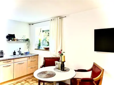 Küche/Küchenzeile in der Unterkunft GastRoom Am Seefeld