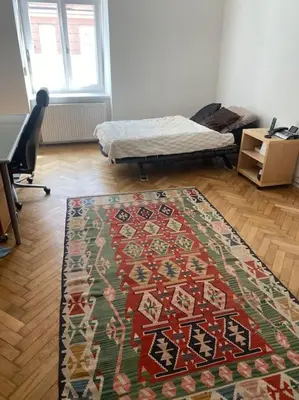 Ein Bett oder Betten in einem Zimmer der Unterkunft Gartenwohnung in Haidhausen