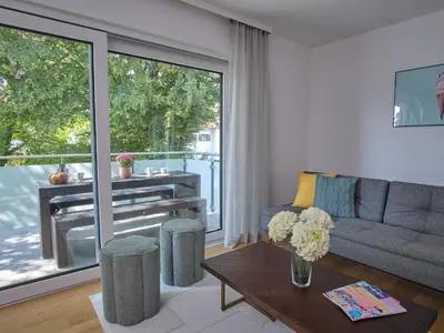 Ein Sitzbereich in der Unterkunft NXT LIV I Kliniknah I 120qm mit Balkon I Nah zu Seen & Berge
