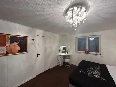 Ein Bett oder Betten in einem Zimmer der Unterkunft Luxuriöses Haus in München