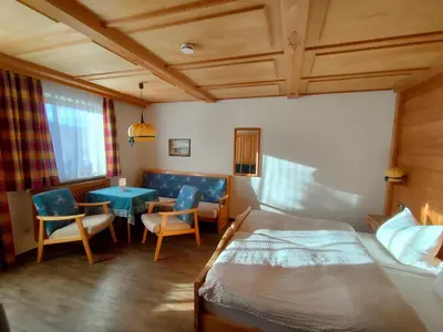 Ein Bett oder Betten in einem Zimmer der Unterkunft Gästehaus Sonnleit`n