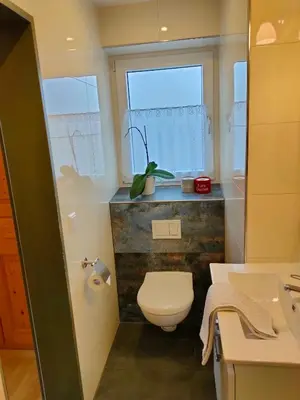 Ein Badezimmer in der Unterkunft Gästehaus Sonnleit`n