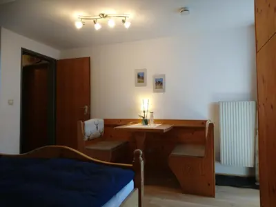 Ein Bett oder Betten in einem Zimmer der Unterkunft Gästehaus Sonnleit`n