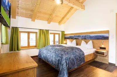 Ein Bett oder Betten in einem Zimmer der Unterkunft Ferienhof Oberhuber