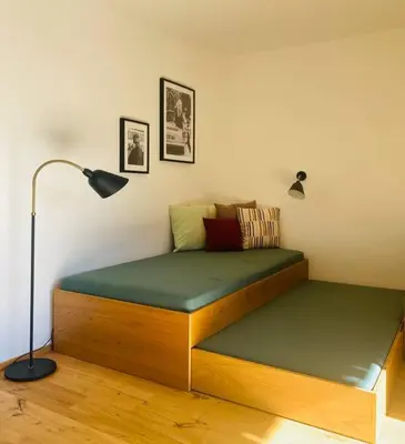 Ein Bett oder Betten in einem Zimmer der Unterkunft Traumhafte Ferienwohnung in historischem Brandmanngut
