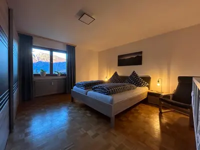 Ein Bett oder Betten in einem Zimmer der Unterkunft Ferienwohnung Am Nussbaum