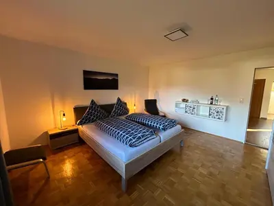 Ein Bett oder Betten in einem Zimmer der Unterkunft Ferienwohnung Am Nussbaum