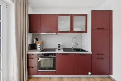 Küche/Küchenzeile in der Unterkunft Vaicun Stays - Stilvolle Apartments am Tegernsee