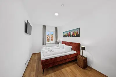 Ein Bett oder Betten in einem Zimmer der Unterkunft Vaicun Stays - Stilvolle Apartments am Tegernsee