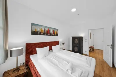 Ein Bett oder Betten in einem Zimmer der Unterkunft Vaicun Stays - Stilvolle Apartments am Tegernsee