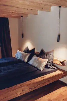 Ein Bett oder Betten in einem Zimmer der Unterkunft Chalet-Apartments Am Schmiedhof
