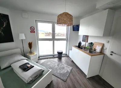 Küche/Küchenzeile in der Unterkunft Modernes Apartment mit WIFI, Aufzug & Kostenlos Parken EL-Living