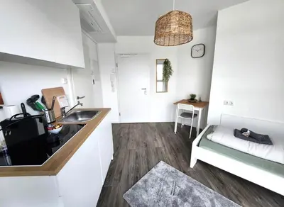 Küche/Küchenzeile in der Unterkunft Modernes Apartment mit WIFI, Aufzug & Kostenlos Parken EL-Living