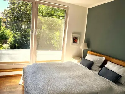 Ein Bett oder Betten in einem Zimmer der Unterkunft Atelier Seeshaupt