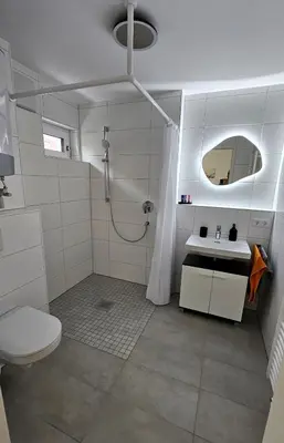 Ein Badezimmer in der Unterkunft Apartment Küche Arbeitsplatz Netflix WLan Barrierefrei