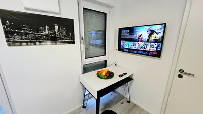 TV/Unterhaltungsangebot in der Unterkunft Apartment Küche Arbeitsplatz Netflix WLan Barrierefrei