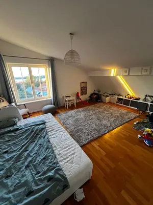Ein Bett oder Betten in einem Zimmer der Unterkunft Panoramahaus am Ammersee I Sauna I Wellness I Kamin