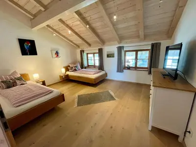 Ein Bett oder Betten in einem Zimmer der Unterkunft Ferienwohnung Wagner