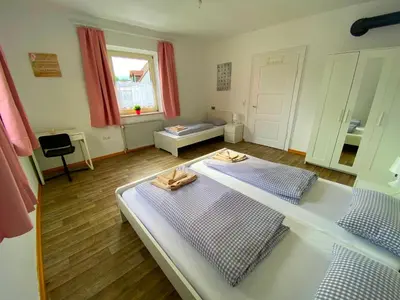 Ein Bett oder Betten in einem Zimmer der Unterkunft Ferienzimmer Fischach