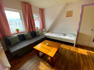 Ein Bett oder Betten in einem Zimmer der Unterkunft Ferienzimmer Fischach
