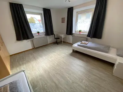 Ein Bett oder Betten in einem Zimmer der Unterkunft Ferienzimmer Fischach