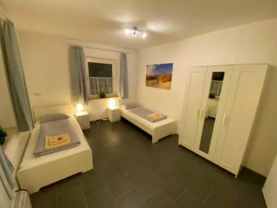 Ein Bett oder Betten in einem Zimmer der Unterkunft Ferienzimmer Fischach