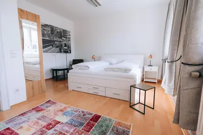 Ein Bett oder Betten in einem Zimmer der Unterkunft Apartment mit großer Küche in der Ingolstädter City