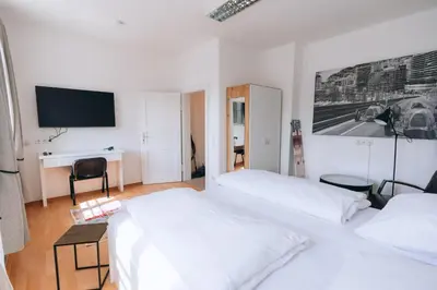 Ein Bett oder Betten in einem Zimmer der Unterkunft Apartment mit großer Küche in der Ingolstädter City