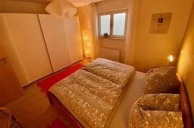 Ein Bett oder Betten in einem Zimmer der Unterkunft Ferienwohnung Zum Drachenstich