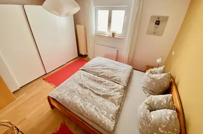 Ein Bett oder Betten in einem Zimmer der Unterkunft Ferienwohnung Zum Drachenstich