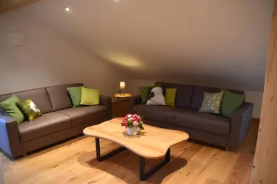 Ein Sitzbereich in der Unterkunft Ferienwohnung beim Hainz