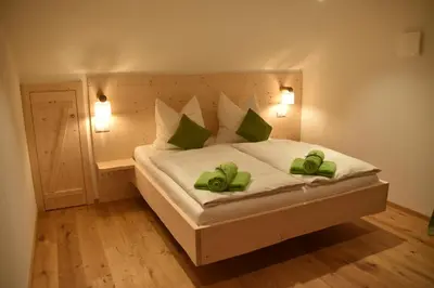 Ein Bett oder Betten in einem Zimmer der Unterkunft Ferienwohnung beim Hainz