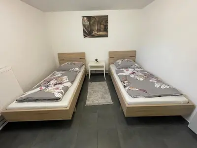 Ein Bett oder Betten in einem Zimmer der Unterkunft Handwerkerwohnung KG Sutterain