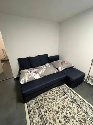 Ein Sitzbereich in der Unterkunft Handwerkerwohnung KG Sutterain