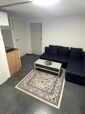 Ein Sitzbereich in der Unterkunft Handwerkerwohnung KG Sutterain