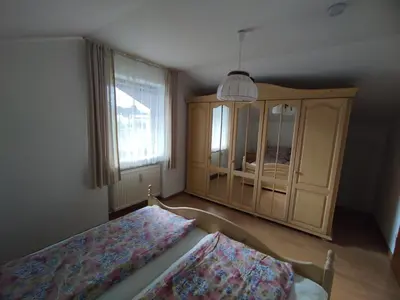 Ein Bett oder Betten in einem Zimmer der Unterkunft FeWoIngrid
