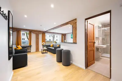 Ein Sitzbereich in der Unterkunft Homaris Apartments München Laim